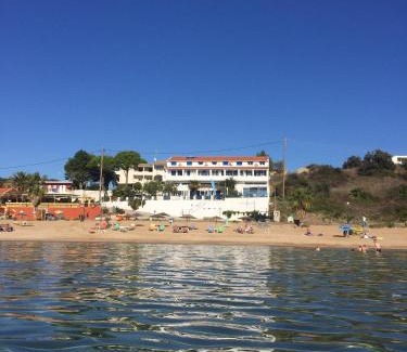 Agios Georgios Pagon Apartment | Experience ILIOS: Guest Rated 9.7 with Oceanfront Views