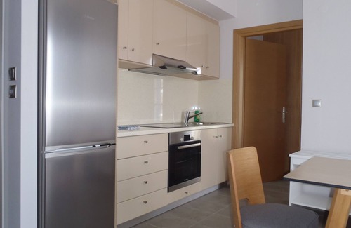 Paralia Agias Fotinis House | Ocean View Ilioxenia Studio & Apartments Rated 9.6/10