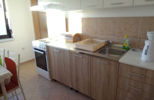 Zdrelac Apartment | Relax at Ilsad Apartments: Poolside Retreat Near the Sea