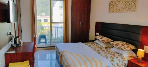 Tapovan Apartment | Ima Ganga Hotel - Aesthetic, Quite Mountain View Rooms With Netflix, free airport pickup for booking more than 7 nights, Elevator, Backup, Room Heater In Upper Tapovan