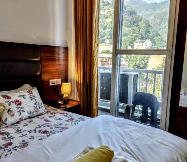 Tapovan Apartment | Ima Ganga Hotel - Aesthetic, Quite Mountain View Rooms With Netflix, free airport pickup for booking more than 7 nights, Elevator, Backup, Room Heater In Upper Tapovan