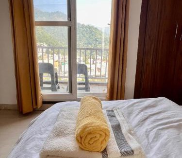 Tapovan Apartment | Ima Ganga Hotel - Aesthetic, Quite Mountain View Rooms With Netflix, free airport pickup for booking more than 7 nights, Elevator, Backup, Room Heater In Upper Tapovan