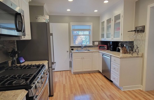 Lansing House | Spotless Retreat Near MSU with Hot Tub and Breakfast