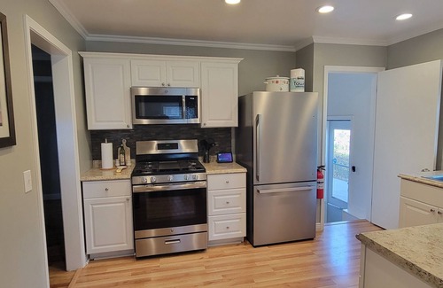 Lansing House | Spotless Retreat Near MSU with Hot Tub and Breakfast