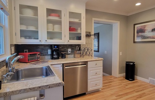 Lansing House | Spotless Retreat Near MSU with Hot Tub and Breakfast
