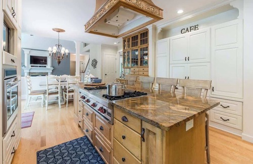 Alexandria House | Experience Elegance: Grand Lakefront Haven with Deck & Fire Pit