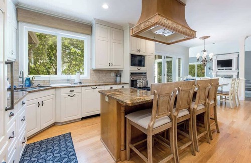 Alexandria House | Experience Elegance: Grand Lakefront Haven with Deck & Fire Pit