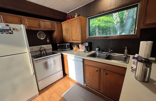 Kewadin House | Imogene's Torch Lake Cottage: Waterfront Retreat with Dock