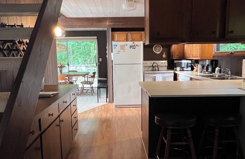 Kewadin House | Imogene's Torch Lake Cottage: Waterfront Retreat with Dock