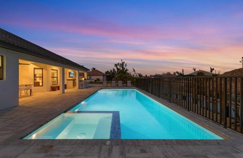Burnt Store House | Impeccable Gulf Access Villa with Dock and Tiki Bar