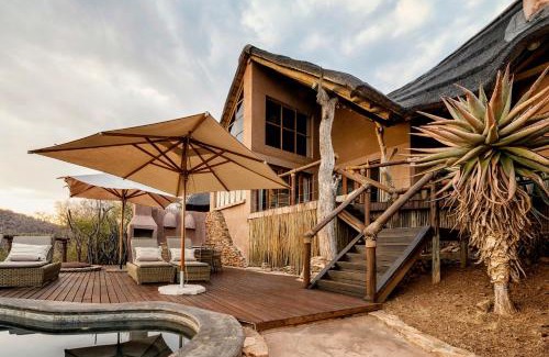 Madikwe Game Reserve Cabin | Impodimo Game Lodge: 5-Star Retreat with Ocean Views