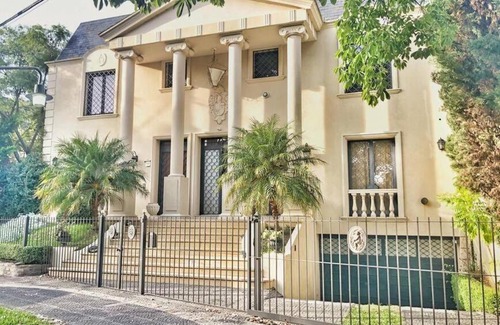 Acassuso Villa | Elegant Paladio-Style Home with Pool & Pet-Friendly Amenities