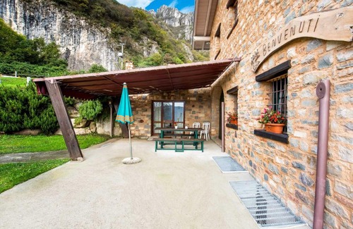 Marone Ski Chalet | Tranquil Escape: Poolside Haven with Lake Views