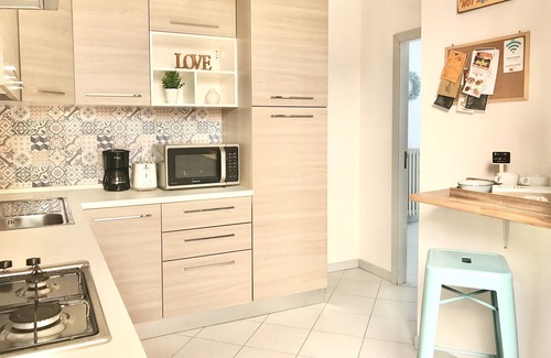 Cattolica Apartment | Central Retreat with Terrace, Wi-Fi & Ocean View Amenities