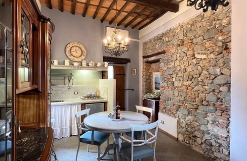 Mologno Apartment | Explore Historic Barga: Poolside Retreat in City Center
