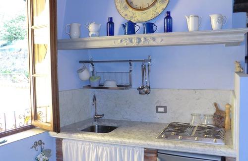 Mologno Apartment | Explore Historic Barga: Poolside Retreat in City Center