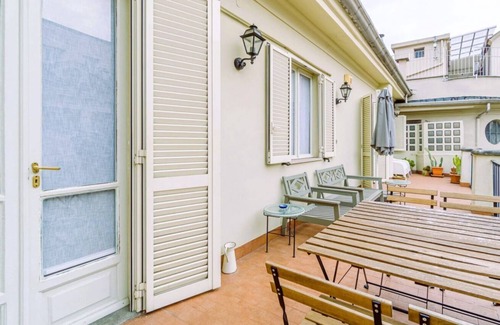 Roman Quarter Apartment | In the heart of the Quadrilatero Romano, this spacious 120 sqm apartment accommodates up to 9 guests. Located on the fourth floor with an elevator (not suitable for disabled people), it features a large terrace perfect for relaxing. The area is lively an