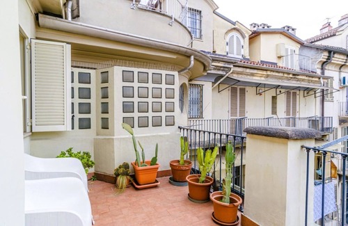 Roman Quarter Apartment | In the heart of the Quadrilatero Romano, this spacious 120 sqm apartment accommodates up to 9 guests. Located on the fourth floor with an elevator (not suitable for disabled people), it features a large terrace perfect for relaxing. The area is lively an