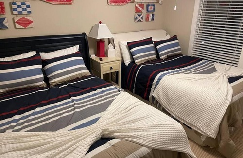 Harbour Town House | Prime Harbour Town Getaway: 2BR with Pool & Beach Access