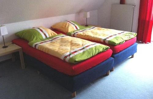 Flintbek House | Discover Comfort at Am Redder: Family & Pet-Friendly Stays