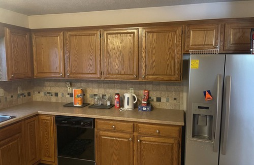 Greenwich House | Convenient Hotel Steps from Walmart, Starbucks & Dining