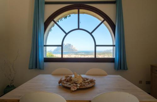Porto San Paolo House | Picturesque Villa with Garden and Sea Views for Families