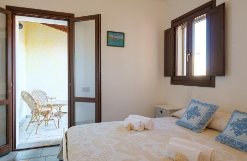 Porto San Paolo House | Picturesque Villa with Garden and Sea Views for Families