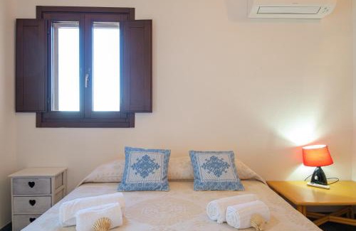 Porto San Paolo House | Picturesque Villa with Garden and Sea Views for Families