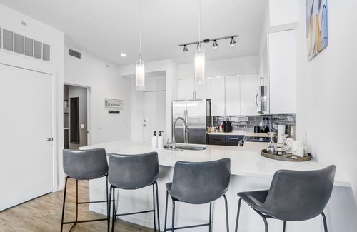 Channel District Apartment | Indulge in a City View Sky Lounge & Top Gym Access