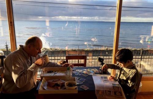 Punta Arenas House | Inviting Retreat by the Strait of Magellan with Ocean Views