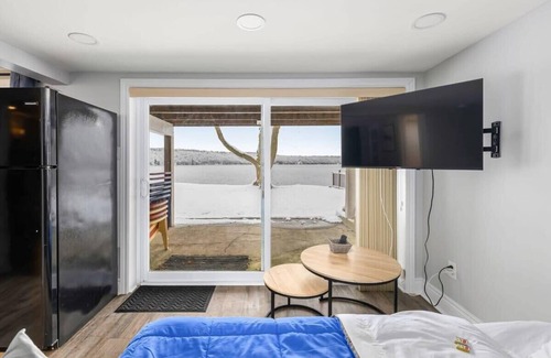 Rideau Lakes House | Incredible water view with canoe and kayaks