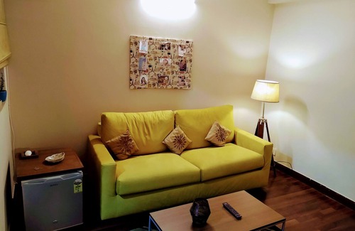 Noida Apartment | Elegant Studio Apartment Near Expo Mart with Pool Access