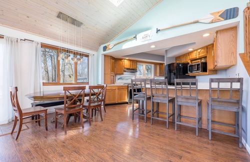 Lakeview House | Elegant Indian Lakefront Retreat with Boathouse & Pool