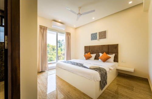 Pilerne Apartment | iNDO - Homtel: Family-Friendly Stay with Pool Access