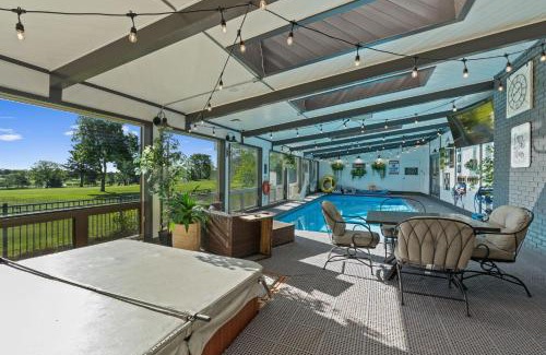 Loveland House | Relaxing Retreat with Indoor Pool and Hot Tub on Golf Course