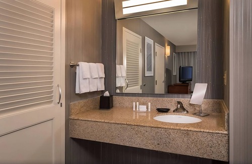 Columbia Hotel | Experience Homely Comfort Near Lake Kittamaqundi with Pool