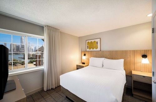 Exchange Place North Hotel | Indulge in NYC Views! Pet-friendly Property with Full Kitchen, Parking!