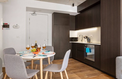 St Kilda Condo | Industrial Style Retreat on Chapel Street for Families
