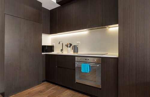 St Kilda Condo | Industrial Style Retreat on Chapel Street for Families