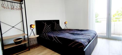 Saint-Priest Apartment | Modern Indy Appart: Family-Friendly Retreat with a Balcony