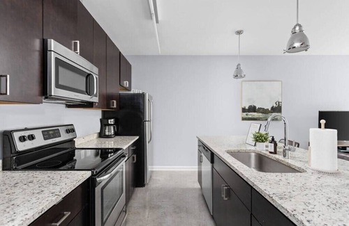 Cole-Noble District Apartment | CozySuites: 1BR Near Indy Monument Circle with Pool & Kitchen