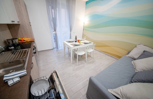 Albenga Apartment | Ines: Ideal Getaway for Families with Kitchen & Breakfast