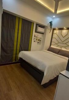 Project 4 Apartment | Modern 2-BR Infina Towers Unit with Balcony in QC, Manila