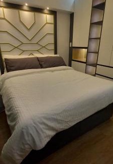 Project 4 Apartment | Modern 2-BR Infina Towers Unit with Balcony in QC, Manila