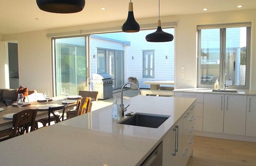 Omaha House | Explore Private Beachfront Bliss with Ocean View Amenities