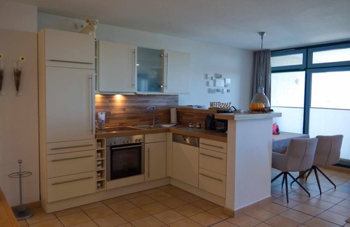 Fehmarn Apartment | Inselblume 50: Private Beach Castle with Ocean View