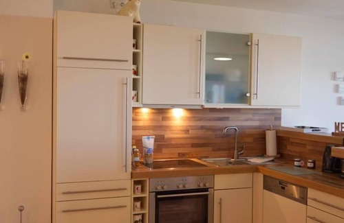 Fehmarn Apartment | Inselblume 50: Private Beach Castle with Ocean View