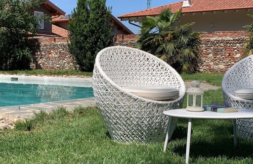 Vaprio d'Agogna Villa | Discover Intera Villa: Poolside Retreat with Scenic Views