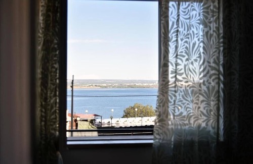 Taranto Apartment | Central Apartment with Kitchen Access and City Views