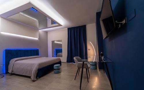Qualiano Hotel | Elegant Intimity Rooms with Breakfast & Hot Tub Access
